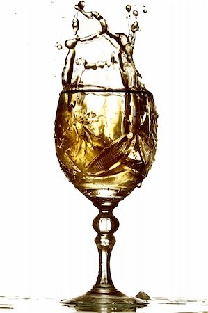 wine splash in glass isolated on white background Stock Photo - Budget Royalty-Free & Subscription, Code: 400-05100041