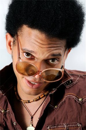 simsearch:400-04539832,k - Portrait of young trendy african man with retro sunglasses Foto de stock - Royalty-Free Super Valor e Assinatura, Número: 400-05101130