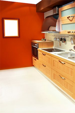 simsearch:400-05132663,k - Contemporary kitchen in light wood with terracotta walls Stock Photo - Budget Royalty-Free & Subscription, Code: 400-05101201
