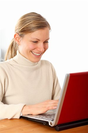 dpix (artist) - young blonde businesswoman working with her laptop and smiling Photographie de stock - Aubaine LD & Abonnement, Code: 400-05101224