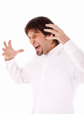 simsearch:400-04554224,k - outraged businessman screaming and pointing his hands towards his head Stock Photo - Budget Royalty-Free & Subscription, Code: 400-05101227