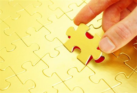 hands holding a puzzle piece . business concepts Stock Photo - Budget Royalty-Free & Subscription, Code: 400-05101404