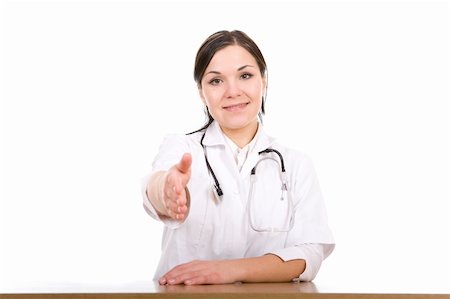 attractive brunette doctor . over white background Stock Photo - Budget Royalty-Free & Subscription, Code: 400-05102667