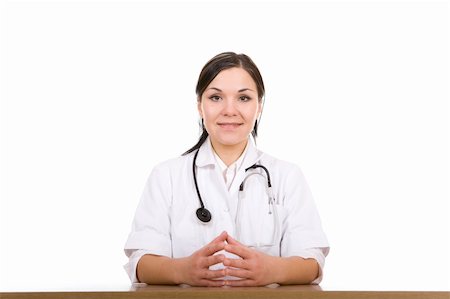 attractive brunette doctor . over white background Stock Photo - Budget Royalty-Free & Subscription, Code: 400-05102668