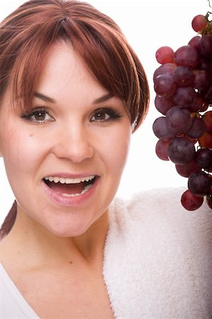 simsearch:400-04564052,k - attractive woman with grapes. over white background Foto de stock - Super Valor sin royalties y Suscripción, Código: 400-05102678