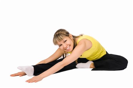 Nice girl stretching. Isolated on white Stock Photo - Budget Royalty-Free & Subscription, Code: 400-05102864