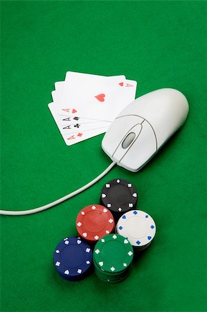 Online casino concept with mouse, cards and casino chips Photographie de stock - Aubaine LD & Abonnement, Code: 400-05103605