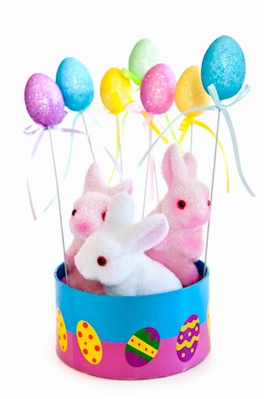 simsearch:400-07422530,k - Cute Easter bunny toys in basket with balloons isolated on white background Fotografie stock - Microstock e Abbonamento, Codice: 400-05114722