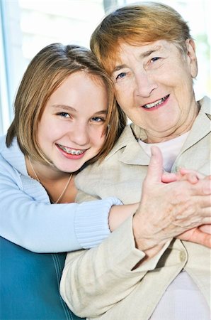 simsearch:400-04300757,k - Granddaughter giving a hug to her grandmother Photographie de stock - Aubaine LD & Abonnement, Code: 400-05114743