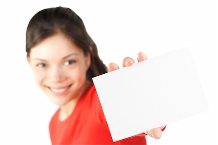 simsearch:400-06137807,k - beautiful eurasian woman holding a blank card. Isolated on white. Foto de stock - Super Valor sin royalties y Suscripción, Código: 400-05115286