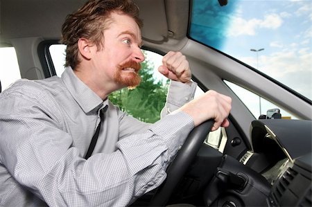 road rage - mad driver in a car Stock Photo - Budget Royalty-Free & Subscription, Code: 400-05115606