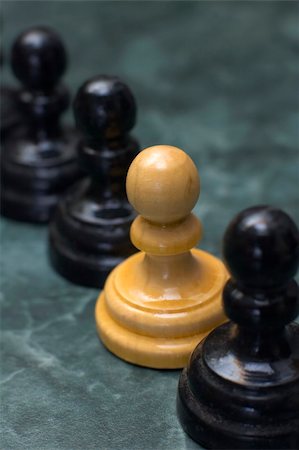 racist - white chess man figure between black ones Stock Photo - Budget Royalty-Free & Subscription, Code: 400-05116023