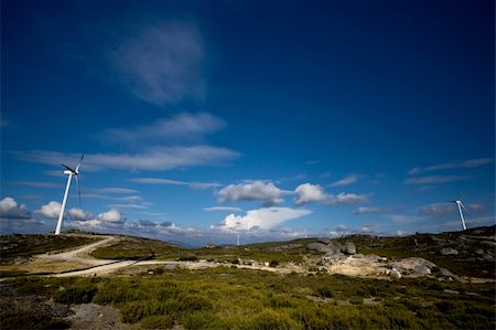 Wind turbines producing clean renewable electric energy - landscape orientation Photographie de stock - Aubaine LD & Abonnement, Code: 400-05116061