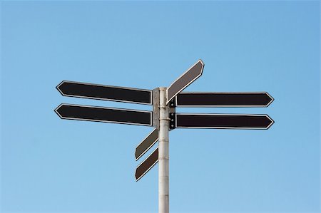 Signpost under blue sky, add your own texts Stock Photo - Budget Royalty-Free & Subscription, Code: 400-05116267
