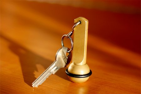 Key of a hotal room on a table Stock Photo - Budget Royalty-Free & Subscription, Code: 400-05116262