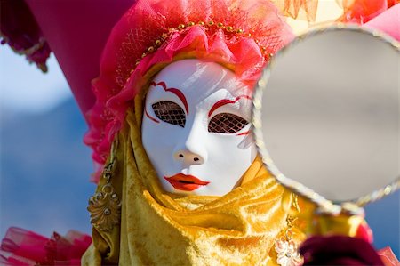 Carnival in venice with model dressed in various costumes and masks - orange lady Stock Photo - Budget Royalty-Free & Subscription, Code: 400-05116298