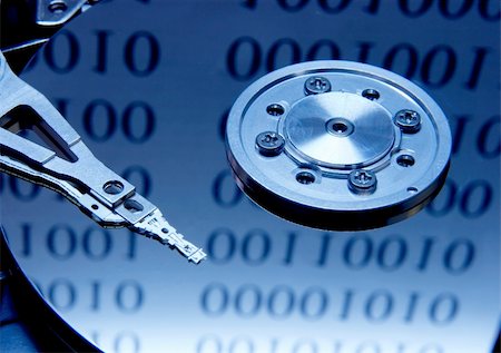 simsearch:400-03992953,k - Internals of a harddisk with binary reflections Stock Photo - Budget Royalty-Free & Subscription, Code: 400-05116394