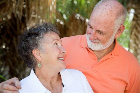 simsearch:400-03972903,k - Adorable senior couple gazes lovingly into each others eyes. Stock Photo - Budget Royalty-Free & Subscription, Code: 400-05116407