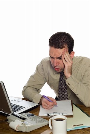 simsearch:400-04782141,k - A confused accountant looking at his recent calculation, isolated against a white background Stock Photo - Budget Royalty-Free & Subscription, Code: 400-05116411