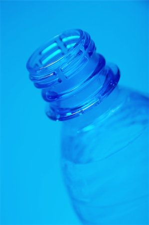 Neck of a plastic bottle in blue Stock Photo - Budget Royalty-Free & Subscription, Code: 400-05116588