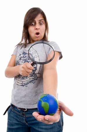 young woman holding small earth globe isolated on white background Stockbilder - Microstock & Abonnement, Bildnummer: 400-05117019
