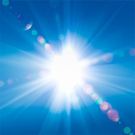 Sun rays against a blue sky Stock Photo - Budget Royalty-Free & Subscription, Code: 400-05117382