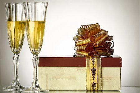 holiday card - golden champagne and gift Stock Photo - Budget Royalty-Free & Subscription, Code: 400-05117419