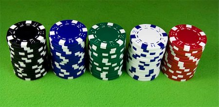 Five color poker casino stacks over green table Stock Photo - Budget Royalty-Free & Subscription, Code: 400-05117958