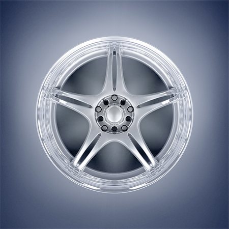 simsearch:400-06858746,k - Car alloy rim on blue background Stock Photo - Budget Royalty-Free & Subscription, Code: 400-05117997