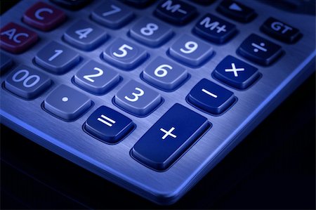 subtracting - Blue toned image of desktop calculator keypad. Black background. Stock Photo - Budget Royalty-Free & Subscription, Code: 400-05118569