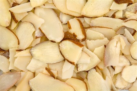 Bunch of Sliced Almonds for use as Background Stock Photo - Budget Royalty-Free & Subscription, Code: 400-05119520