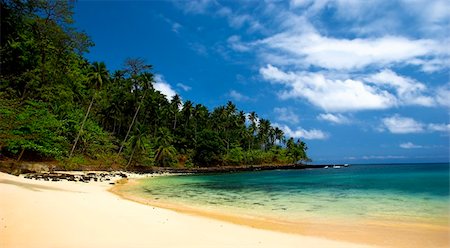 santomean - Beautiful beach with a great blue sky and turqoise water in Sao Tom? - Equator Stock Photo - Budget Royalty-Free & Subscription, Code: 400-05119821