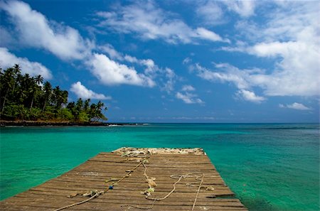 sao tome - Beautiful beach with a great blue sky and turqoise water in Sao Tom? - Equator Photographie de stock - Aubaine LD & Abonnement, Code: 400-05119823