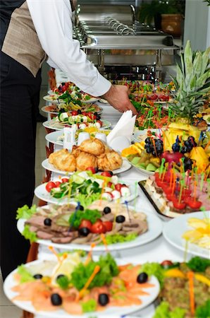 sandwiches many - rich served banquet table with a lot of delicious dishes Stock Photo - Budget Royalty-Free & Subscription, Code: 400-05119865