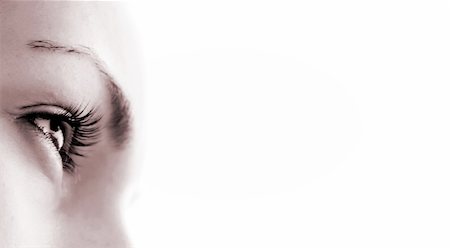 Women's eye - looking forward. Isolated on white. Photographie de stock - Aubaine LD & Abonnement, Code: 400-05110047