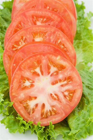 sandwiches row - Six Slices of Tomato Lying on Greens Stock Photo - Budget Royalty-Free & Subscription, Code: 400-05110155