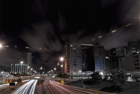 Nighttime highway traffic in downtown district Stock Photo - Budget Royalty-Free & Subscription, Code: 400-05110540