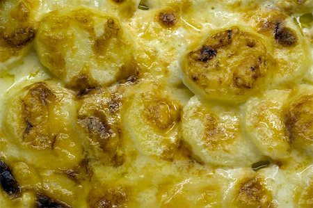 Potato gratin as garnish or entree Photographie de stock - Aubaine LD & Abonnement, Code: 400-05110584