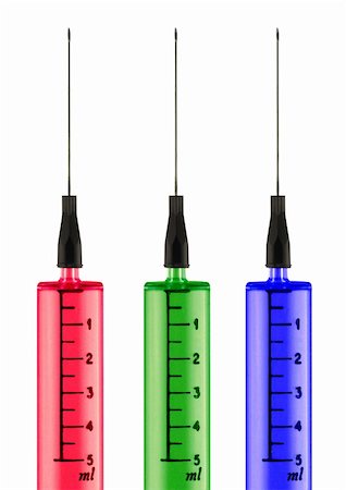 Colorful syringes isolated in whitte Stock Photo - Budget Royalty-Free & Subscription, Code: 400-05110880