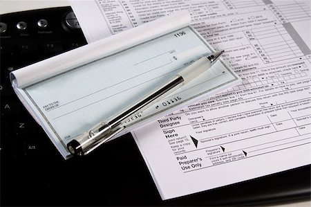 rimborso - Preparing Taxes - Form 1040 for 2008 Fotografie stock - Microstock e Abbonamento, Codice: 400-05111506
