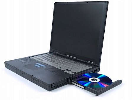 simsearch:400-03909479,k - A black laptop with dvd in tray. Isolated over white background. Foto de stock - Super Valor sin royalties y Suscripción, Código: 400-05111711