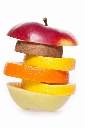 assorted fruits of apple, grapefruit, orange, lemon and kiwi on a white background Stock Photo - Budget Royalty-Free & Subscription, Code: 400-05111920