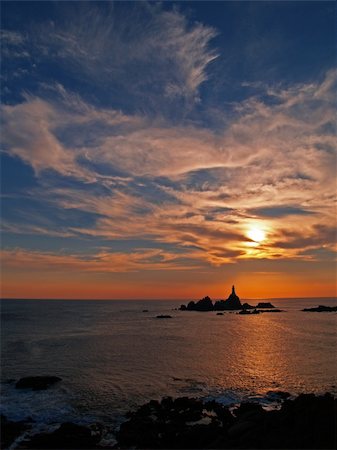 The Corbiere Lighthouse at Corbiere Point on Jersey Stock Photo - Budget Royalty-Free & Subscription, Code: 400-05112068
