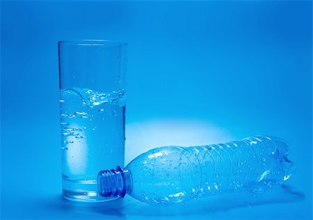 simsearch:400-05291556,k - A glass of water and empty bottle Stock Photo - Budget Royalty-Free & Subscription, Code: 400-05112132