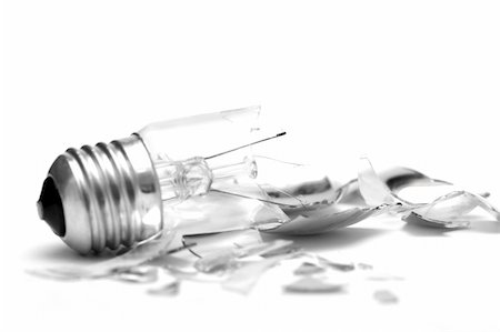 electrical light bulb explosion - Broken lightbulb isolated on pure white background Stock Photo - Budget Royalty-Free & Subscription, Code: 400-05112133