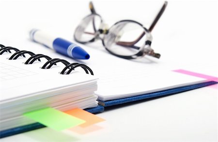 simsearch:400-03990507,k - open notebook with color bookmarks, pen and glasses Stock Photo - Budget Royalty-Free & Subscription, Code: 400-05112195