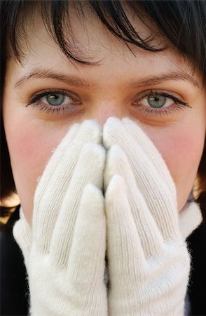 The girl in winter gloves. Winter clothes of white color Stock Photo - Budget Royalty-Free & Subscription, Code: 400-05112274