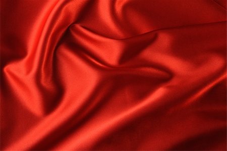 flowing garments - red satin background. A satiny fabric with beautiful light-shadow waves Stock Photo - Budget Royalty-Free & Subscription, Code: 400-05112300