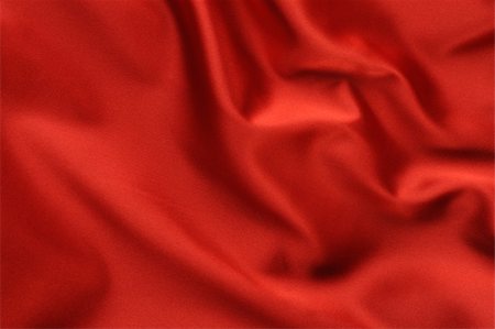 simsearch:630-02220514,k - red satin background. A satiny fabric with beautiful light-shadow waves Stockbilder - Microstock & Abonnement, Bildnummer: 400-05112301