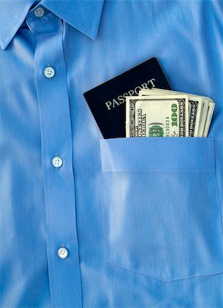 simsearch:400-05215339,k - passport and us currency in the pocket of a button down shirt Stock Photo - Budget Royalty-Free & Subscription, Code: 400-05112332